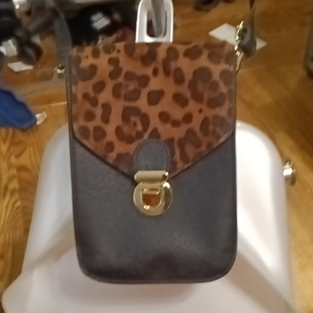 Brand New Mini Leopard print Crossbody phone holder / wallet w/ buckel closure.